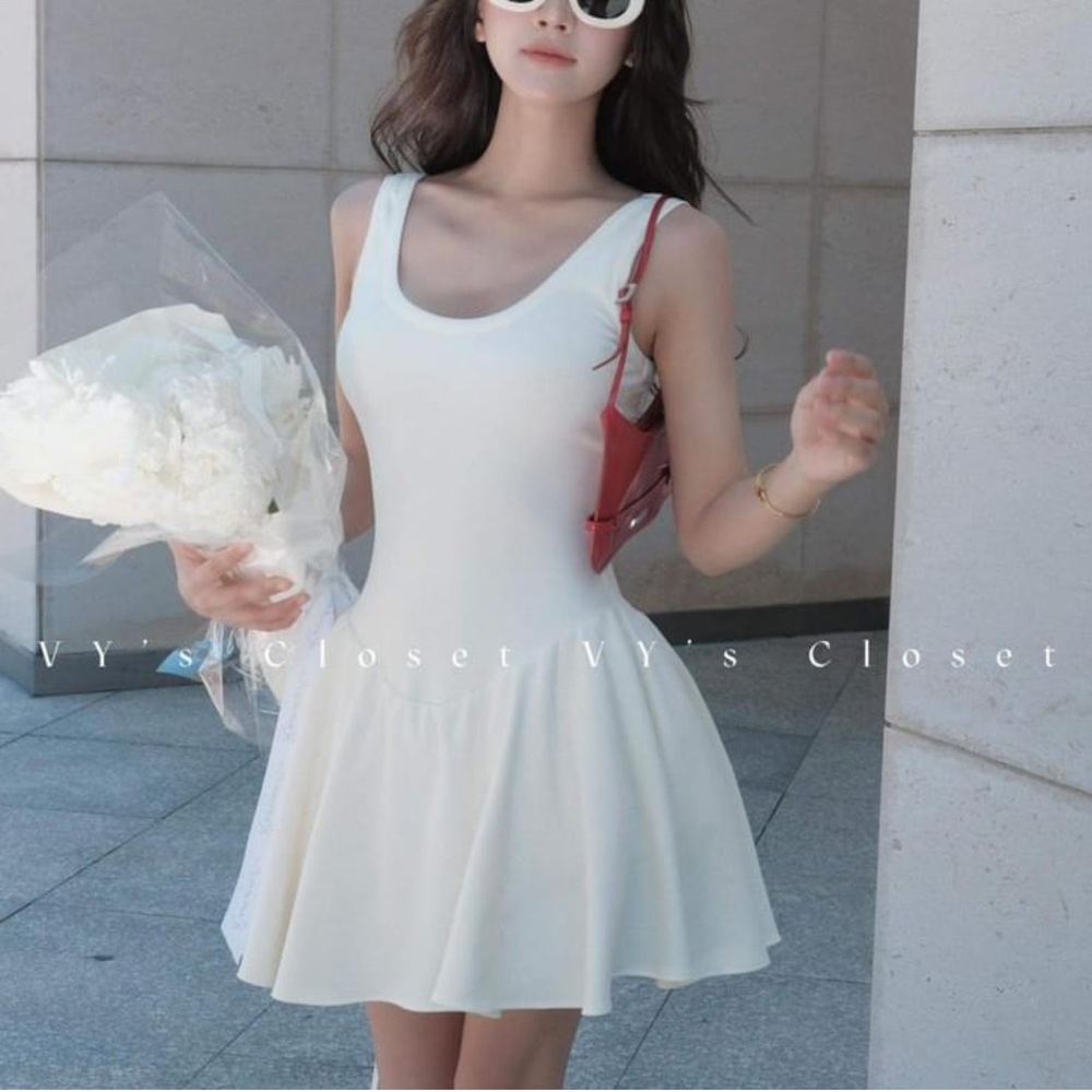 Brand new with tag dress. Design brand from Vietnam. Size small US